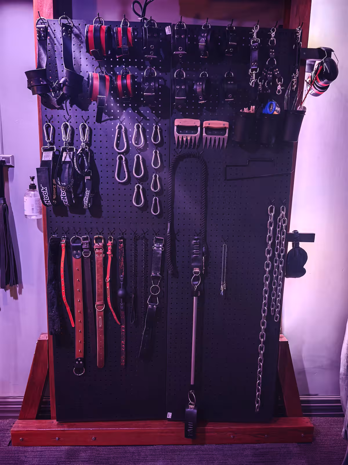 The equipment wall, cuffs and carabiners in detail